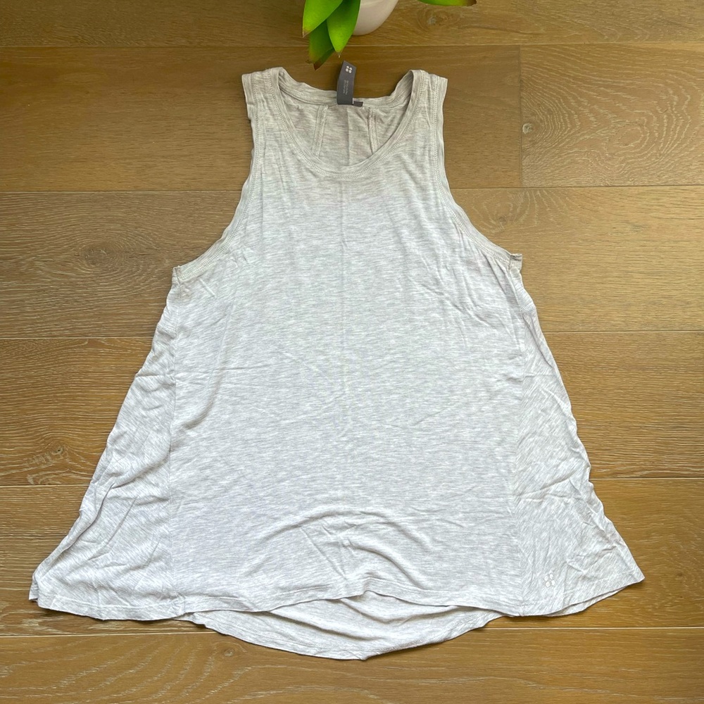 Sweaty Betty swing style tank top.